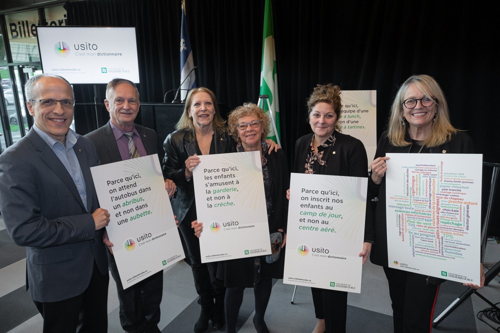 De gauche &agrave; droite, le recteur de l'UdeS, le Pr Pierre Cossette, le Pr &eacute;m&eacute;rite Pierre Martel, coauteur du dictionnaire, la Pre retrait&eacute;e Chantal-&Eacute;dith Masson, directrice informatique du dictionnaire, la Pre&nbsp;retrait&eacute;e&nbsp;H&eacute;l&egrave;ne Cajolet-Lagani&egrave;re, coauteure du dictionnaire, la Pre Anick Lessard, doyenne de la Facult&eacute; des lettres et sciences humaines et la vice-rectrice &agrave; l'administration et au d&eacute;veloppement durable, la Pre Denyse R&eacute;millard.
