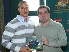 Samuel Giguère et sonentraîneur David Lessard