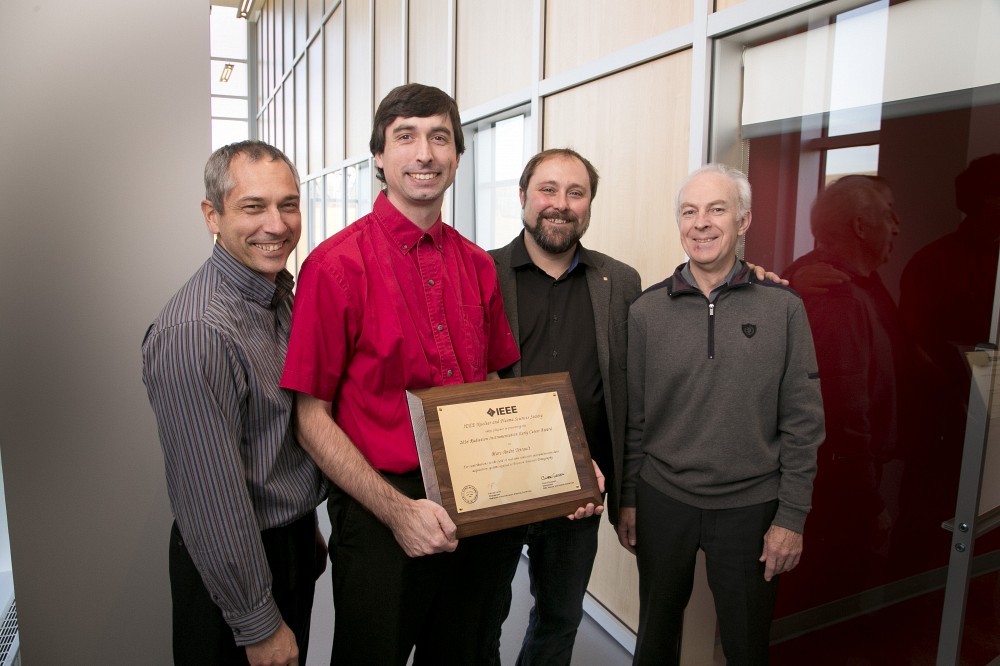 Le r&eacute;cipiendaire Marc-Andr&eacute; T&eacute;trault, entour&eacute; de R&eacute;jean Fontaine, Jean-Fran&ccedil;ois Pratte et Roger Lecomte.