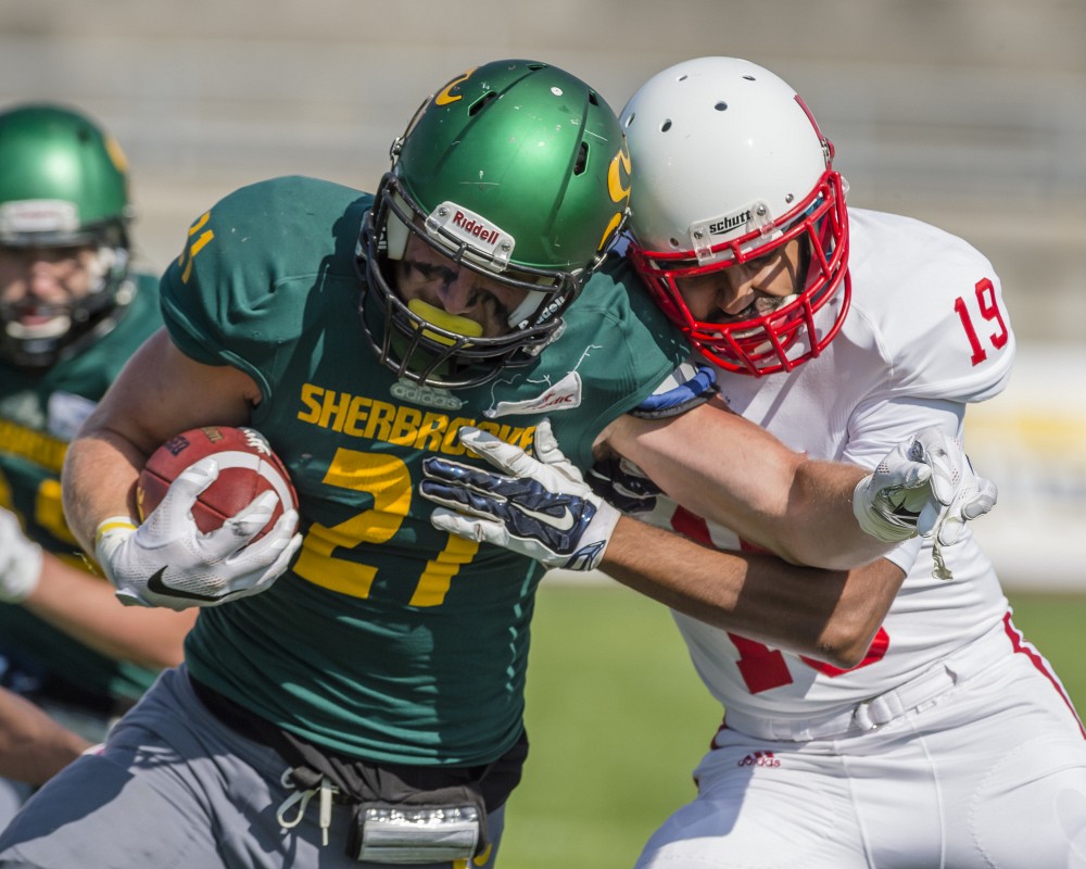 Le porteur de ballon Gabriel Polan a bris&eacute; plusieurs plaqu&eacute;s pour marquer un touch&eacute; spectaculaire au quatri&egrave;me quart.