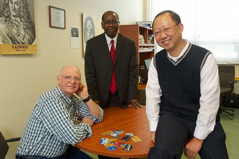 Les professeurs Andr&eacute; Mayers, Ernest Monga et Shengrui Wang