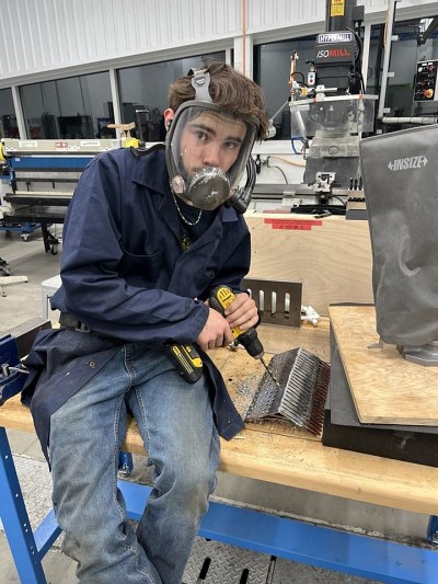 L'un des &eacute;tudiants impliqu&eacute;s dans le projet Solutions BardXpert en plein travail.