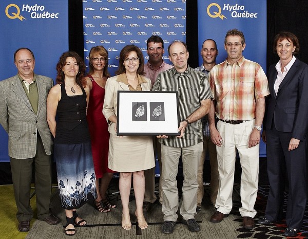 La reconnaissance constitue l'aboutissement d'un travail d'&eacute;quipe, selon Ren&eacute; Alarie, &agrave; gauche sur la photo.